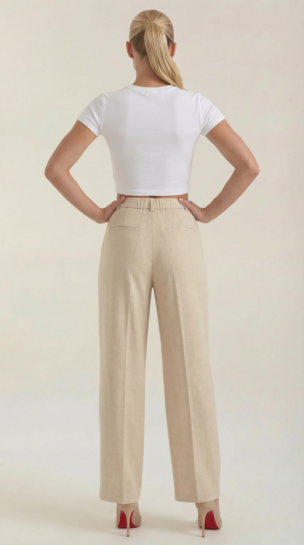 Pantaloni da donna a vita alta con pieghe frontali e gamba larga