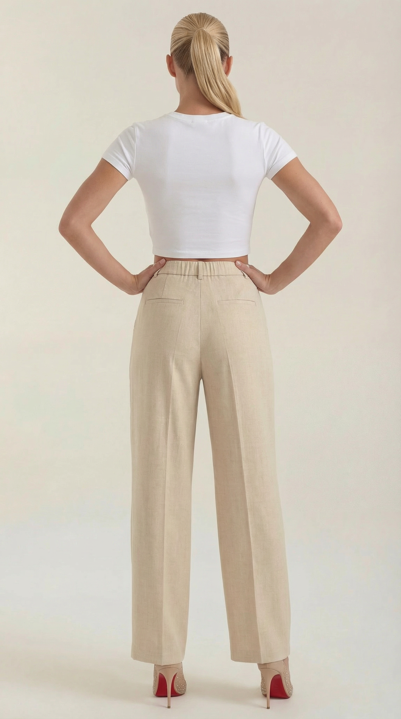 Pantaloni da donna a vita alta con pieghe frontali e gamba larga