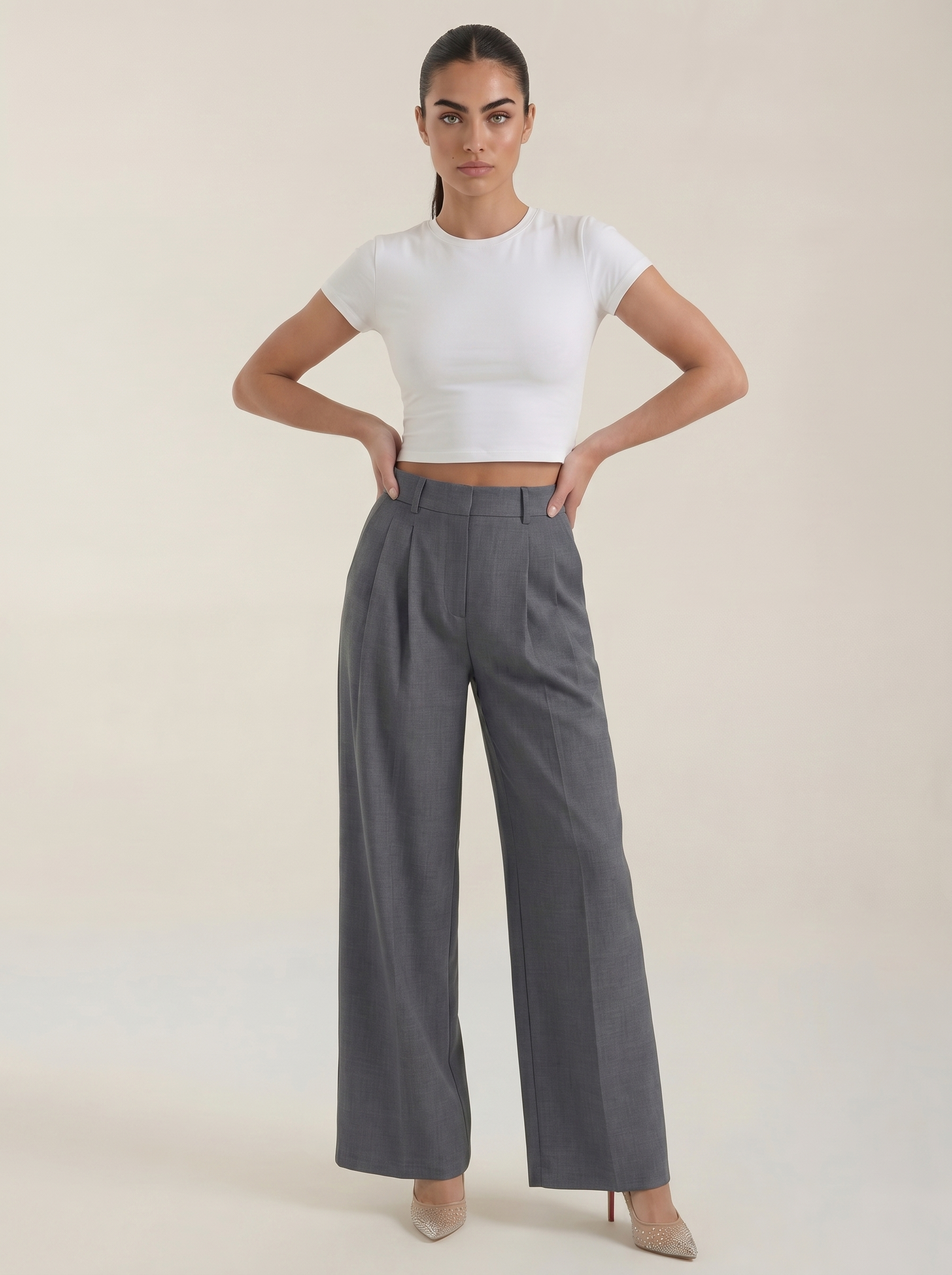 Pantaloni da donna a vita alta con pieghe frontali e gamba larga