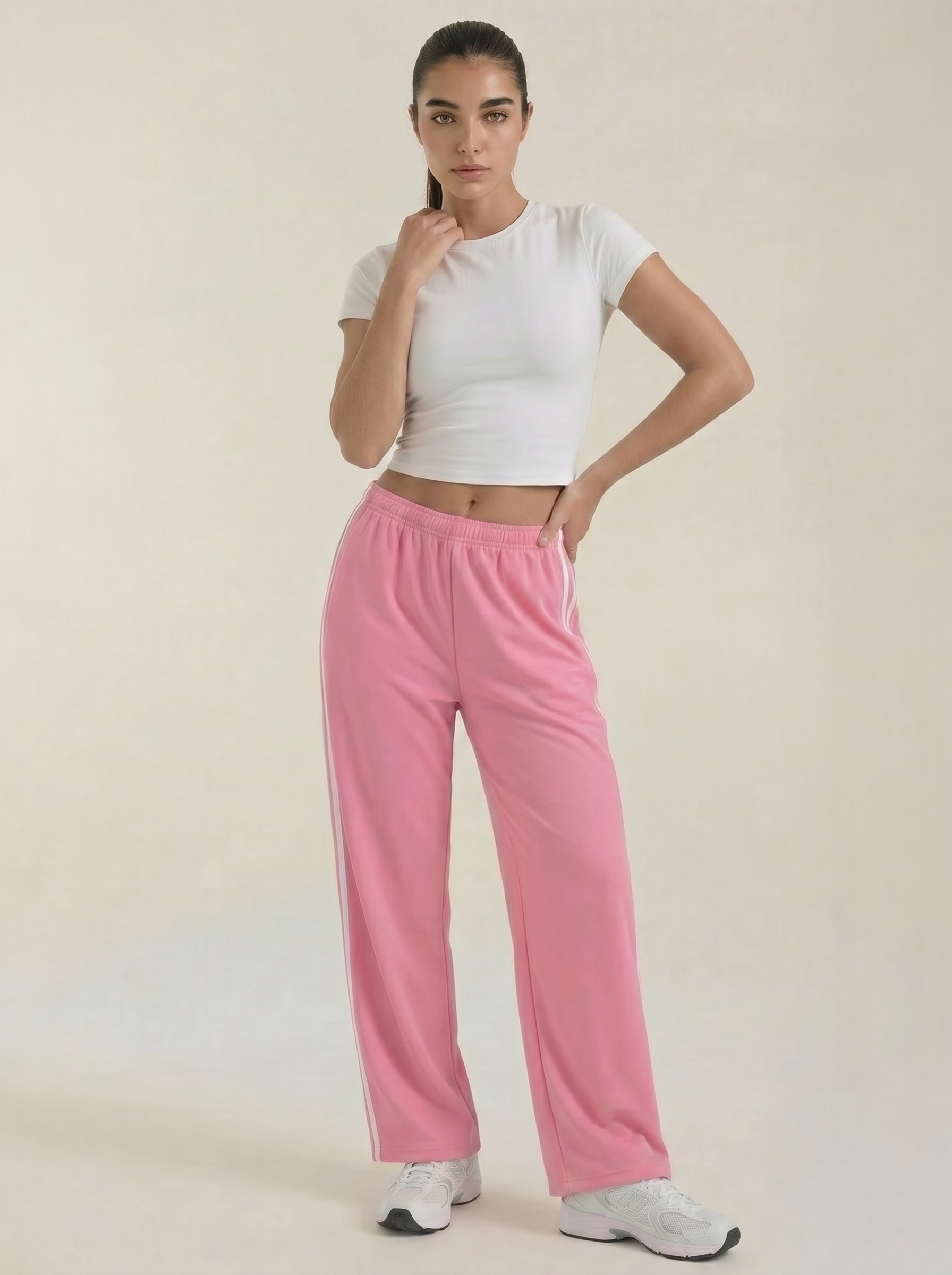 Pantaloni sportivi da donna a gamba larga con righe laterali