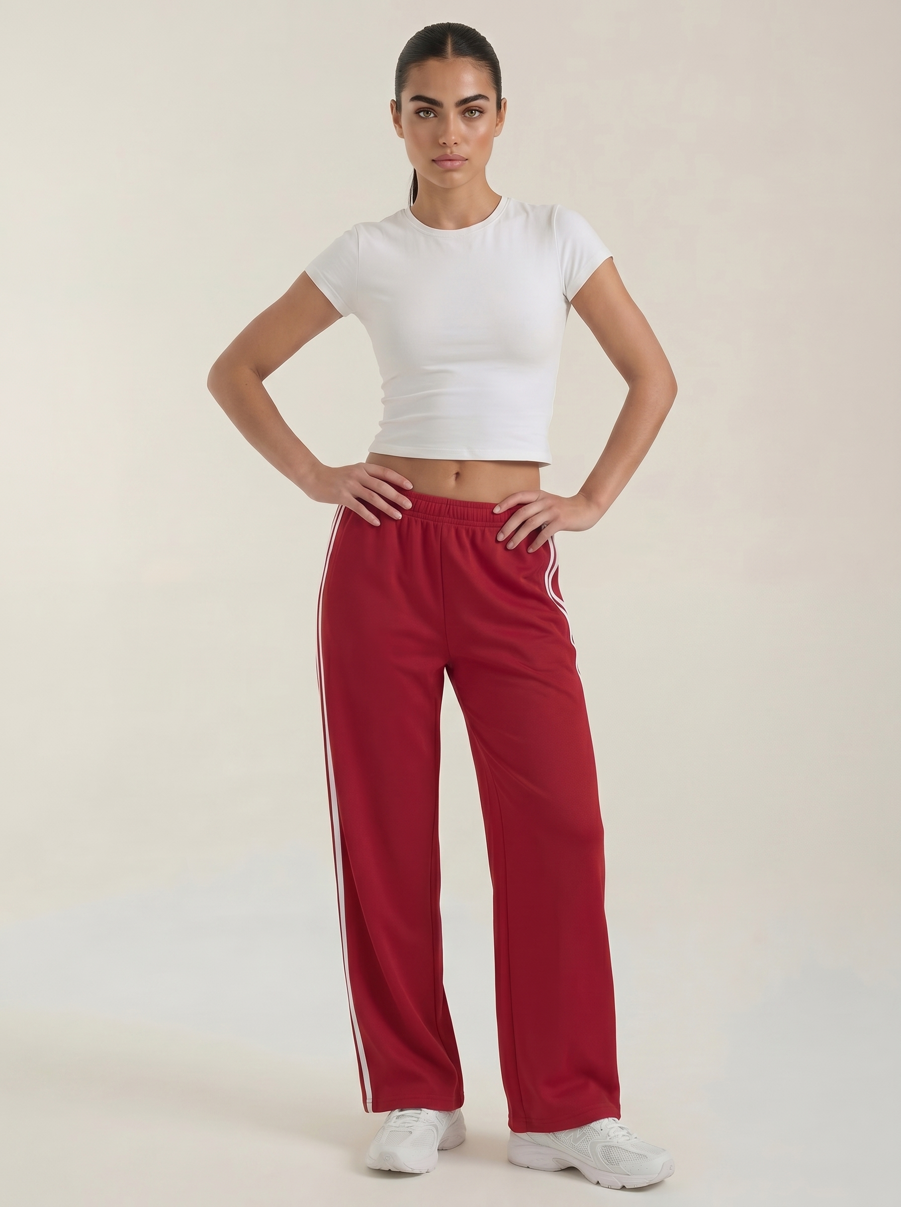 Pantaloni sportivi da donna a gamba larga con righe laterali