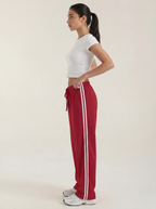 Pantaloni sportivi da donna a gamba larga con righe laterali